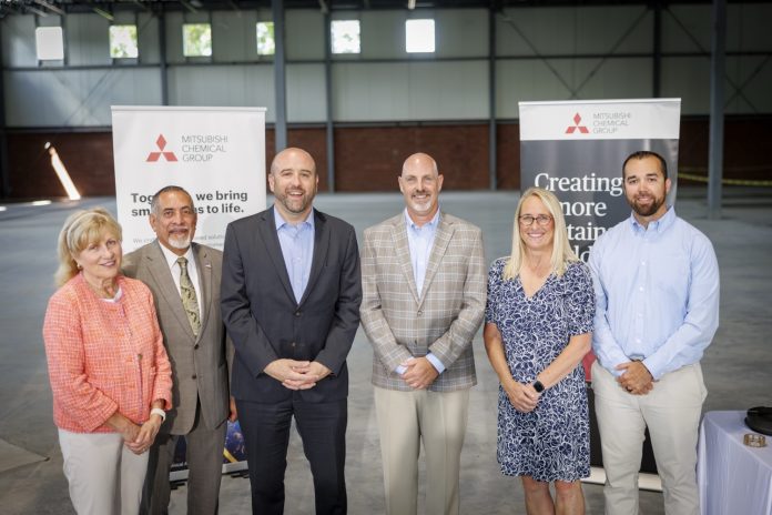 State and local officials pose for a group photo with Mitsubishi Chemical executives following a news conference at Mitsubishi Chemical Advanced Materials in Reading, Pa., on Wednesday, July 8, 2026.